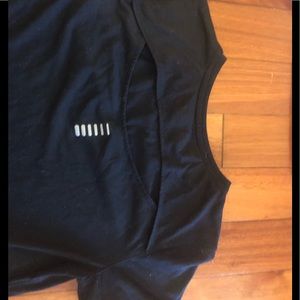 Black under armor shirt with slit on back size xs